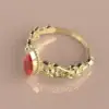 BAGUE-OR-GRENAT-CATALAN-ENORA-66-BOIX.webp